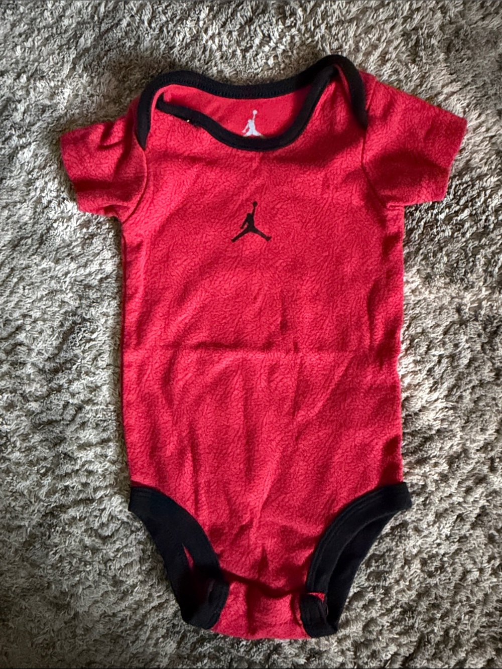 Jordan Red Baby One-Piece Bodysuit with Black Trim
